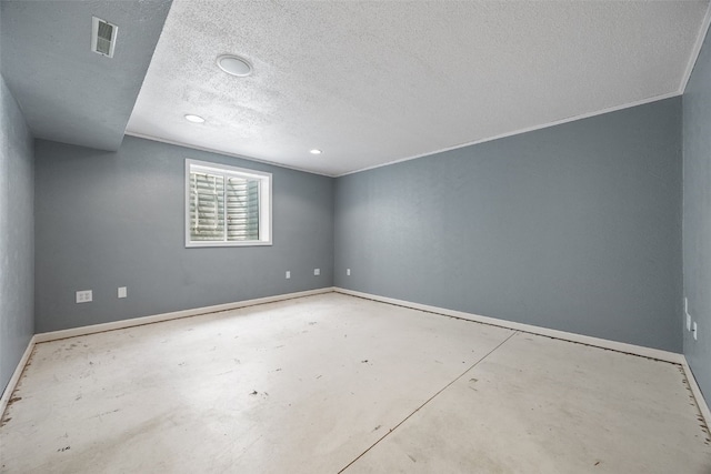 1167 74th St NE, Cedar Rapids, IA 52402 - empty room with a textured ceiling and concrete flooring
