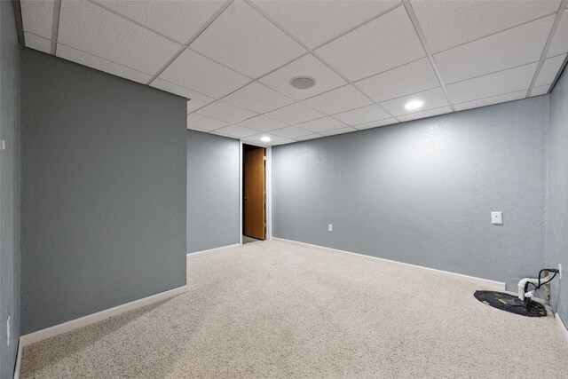 1167 74th St NE, Cedar Rapids, IA 52402 - unfurnished room featuring carpet, a drop ceiling, and recessed lighting