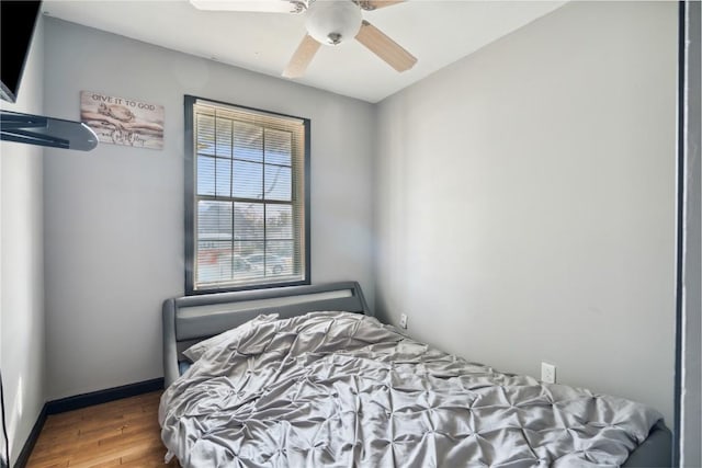 1638 47th St NE, Cedar Rapids, IA 52402 - bedroom featuring wood finished floors and ceiling fan