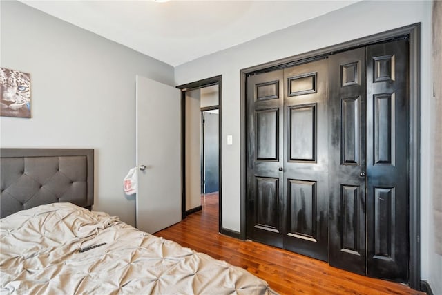 1638 47th St NE, Cedar Rapids, IA 52402 - bedroom with wood finished floors and a closet