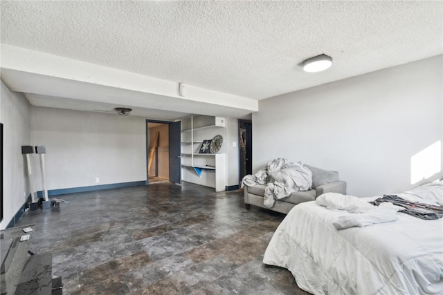1638 47th St NE, Cedar Rapids, IA 52402 - bedroom with a textured ceiling