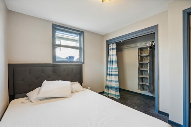 1638 47th St NE, Cedar Rapids, IA 52402 - bedroom featuring baseboards and concrete floors