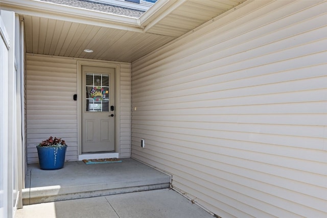 3221 English Cove Ln, Marion, IA 52302 - view of exterior entry featuring roof with shingles