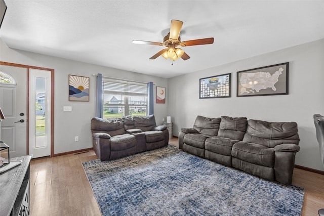 3221 English Cove Ln, Marion, IA 52302 - living area featuring ceiling fan and light wood-type flooring