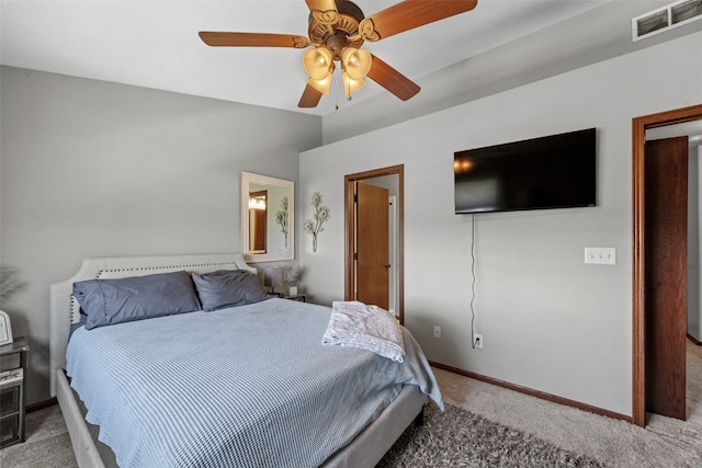 3221 English Cove Ln, Marion, IA 52302 - carpeted bedroom with baseboards and ceiling fan