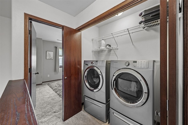 3221 English Cove Ln, Marion, IA 52302 - laundry room featuring light carpet and washer and clothes dryer