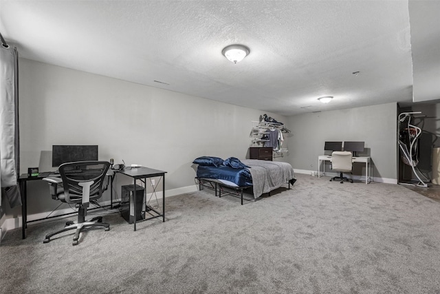 3221 English Cove Ln, Marion, IA 52302 - carpeted bedroom featuring a textured ceiling and an office area