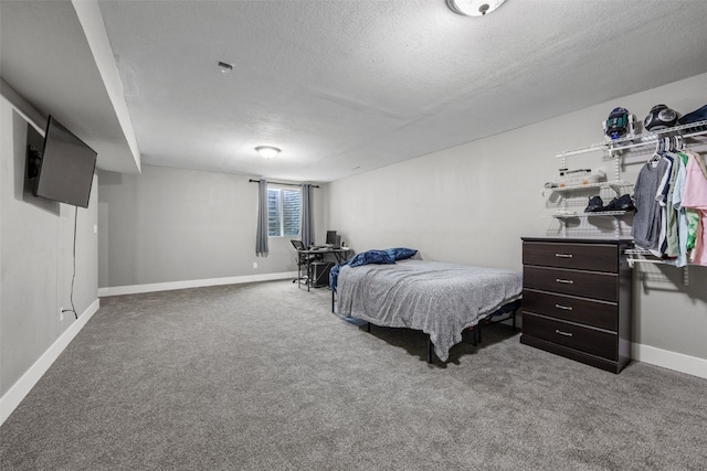 3221 English Cove Ln, Marion, IA 52302 - carpeted bedroom featuring a textured ceiling and baseboards