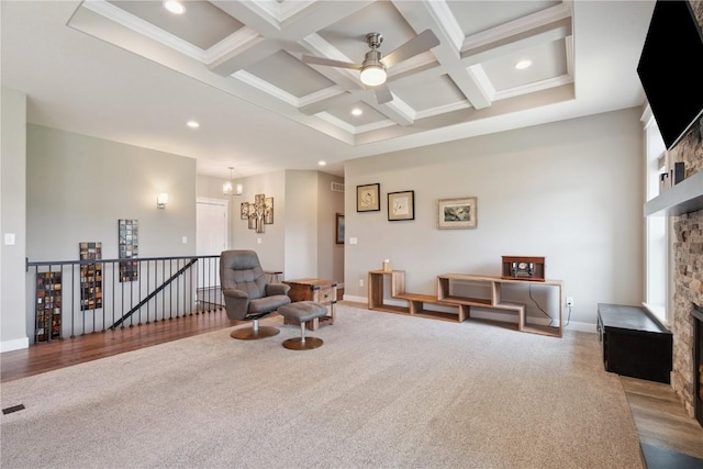 1627 Settlers Dr, Marion, IA 52302 - living area featuring carpet, an upstairs landing, beamed ceiling, coffered ceiling, and ceiling fan