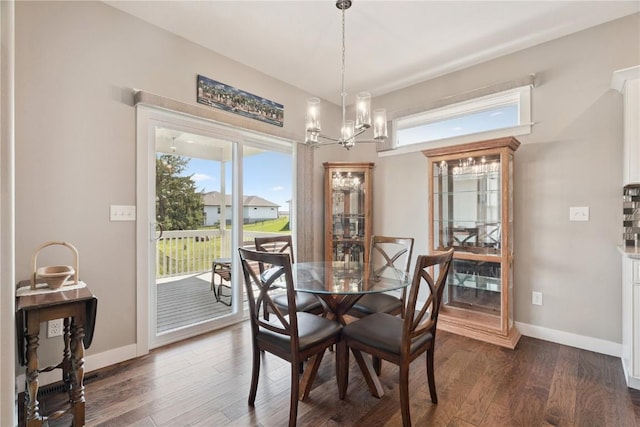 1627 Settlers Dr, Marion, IA 52302 - dining room featuring a chandelier, plenty of natural light, and dark wood-style floors