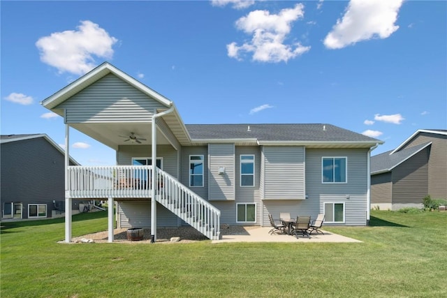 1627 Settlers Dr, Marion, IA 52302 - back of house with a ceiling fan, stairway, a lawn, a patio, and a wooden deck
