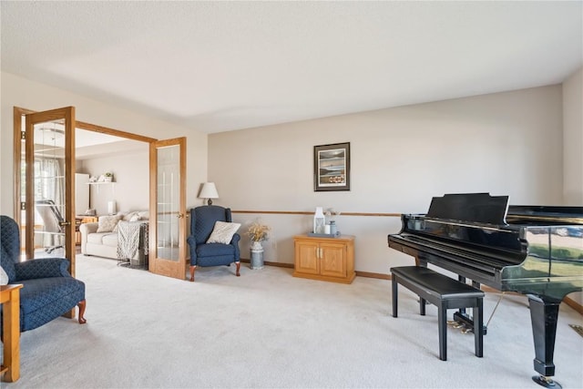 405 Stoney Creek Rd NW, Cedar Rapids, IA 52405 - living area featuring french doors and light carpet