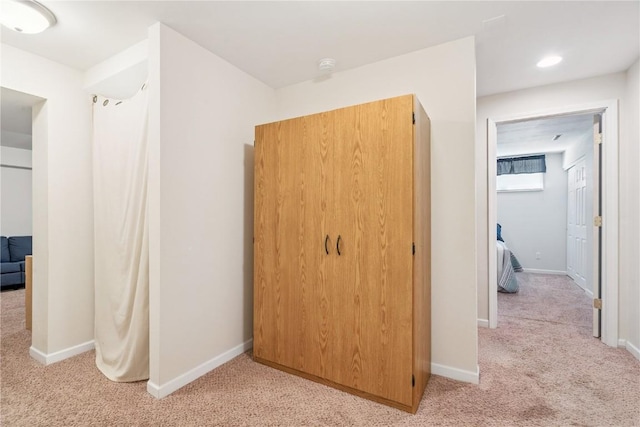 405 Stoney Creek Rd NW, Cedar Rapids, IA 52405 - hall featuring light carpet and recessed lighting