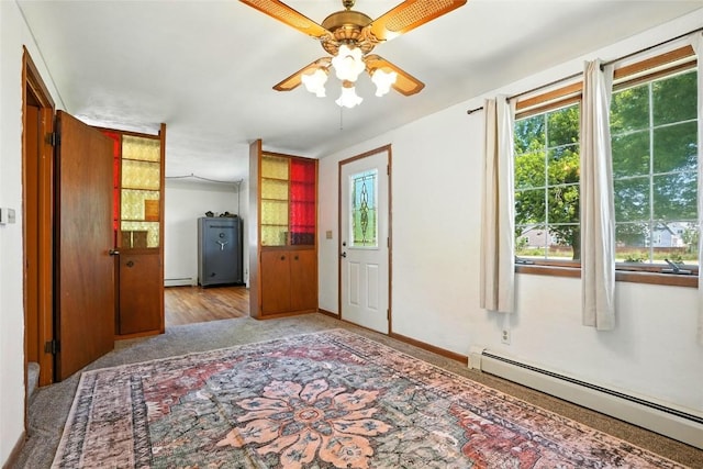 2153 Echo Hill Rd, Marion, IA 52302 - carpeted foyer entrance with baseboard heating and a ceiling fan