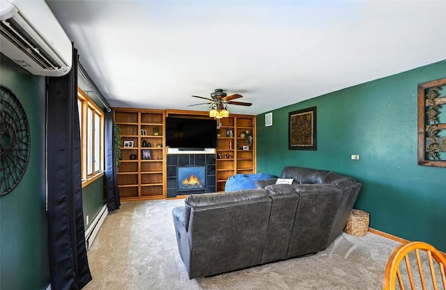 2153 Echo Hill Rd, Marion, IA 52302 - carpeted living area with a wall mounted AC, a ceiling fan, a baseboard heating unit, and a tile fireplace