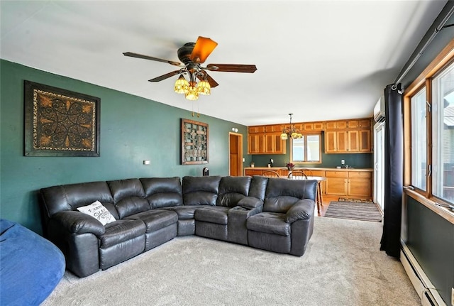 2153 Echo Hill Rd, Marion, IA 52302 - living area with light carpet, baseboard heating, and ceiling fan