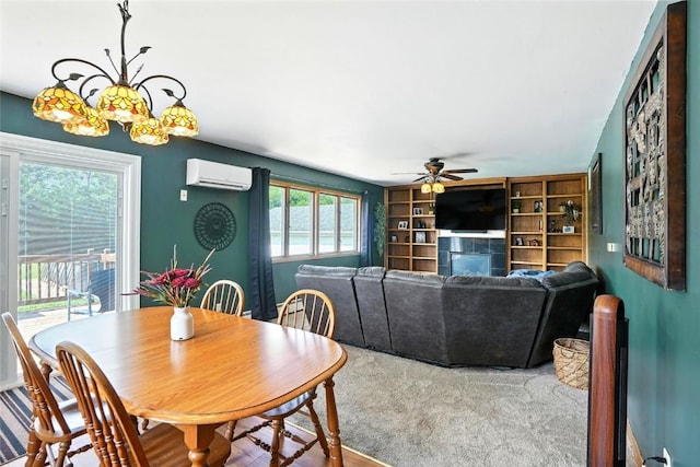 2153 Echo Hill Rd, Marion, IA 52302 - dining area featuring a ceiling fan, a wall unit AC, and built in shelves