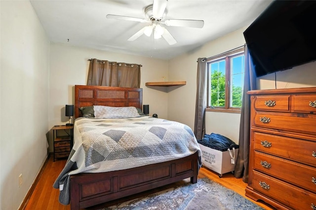 2153 Echo Hill Rd, Marion, IA 52302 - bedroom featuring wood finished floors and a ceiling fan