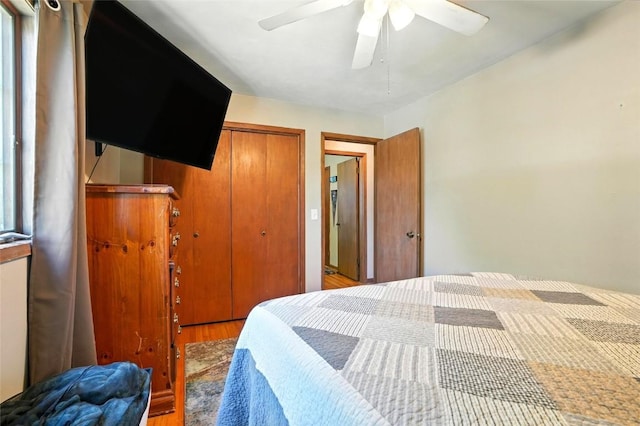 2153 Echo Hill Rd, Marion, IA 52302 - bedroom featuring a closet, wood finished floors, and ceiling fan