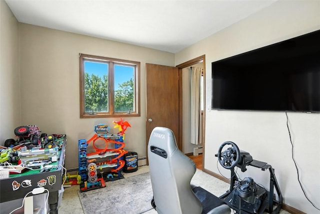 2153 Echo Hill Rd, Marion, IA 52302 - rec room featuring a baseboard radiator
