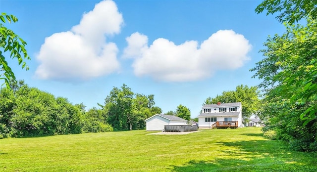 2153 Echo Hill Rd, Marion, IA 52302 - view of grassy yard with a wooden deck