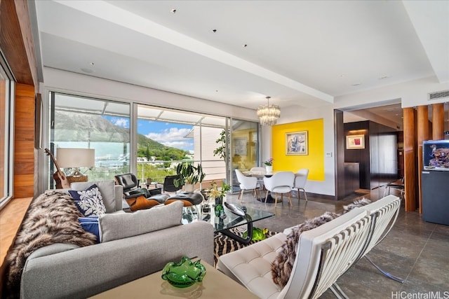 living room featuring a chandelier