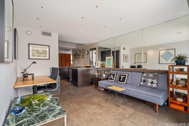 living room featuring light tile patterned floors