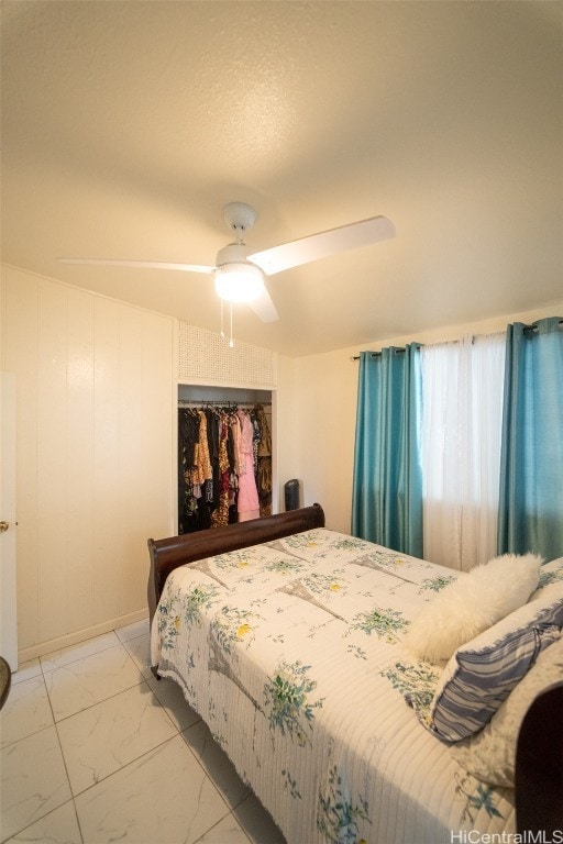 bedroom featuring ceiling fan