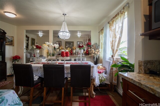 dining room featuring a notable chandelier