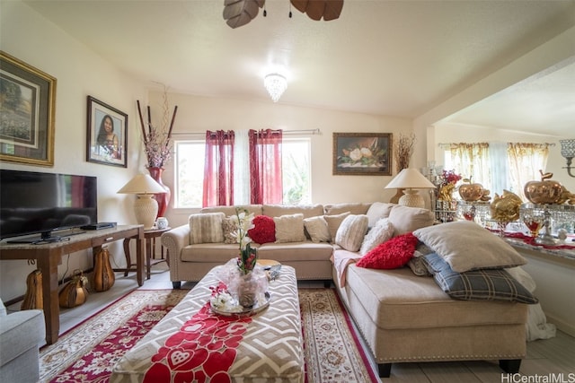 living room featuring vaulted ceiling