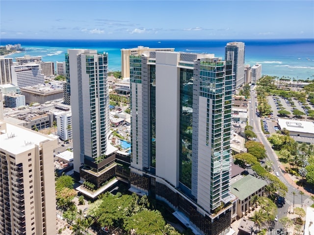 birds eye view of property with a water view