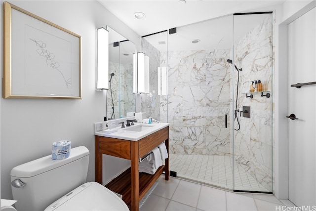 bathroom with vanity, toilet, tile patterned floors, and an enclosed shower