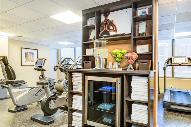 exercise room with a drop ceiling