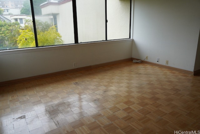 empty room featuring light parquet flooring