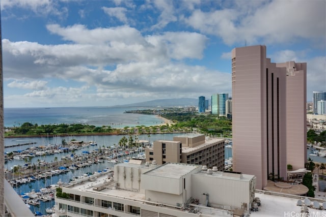 property's view of city featuring a water view