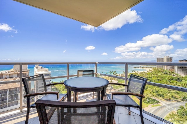 balcony featuring a water view