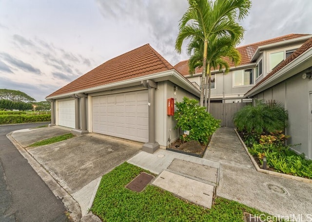 view of front of property with a garage