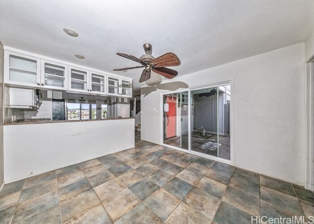 spare room featuring ceiling fan