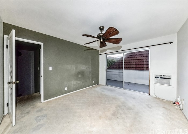 exterior space featuring a wall unit AC, light colored carpet, and ceiling fan