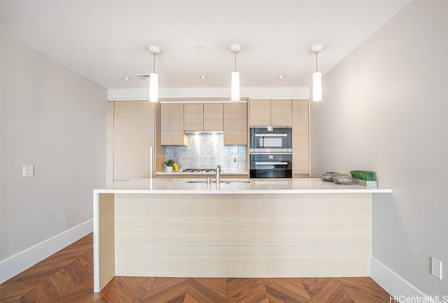 kitchen featuring sink, dark parquet flooring, decorative light fixtures, decorative backsplash, and light brown cabinets