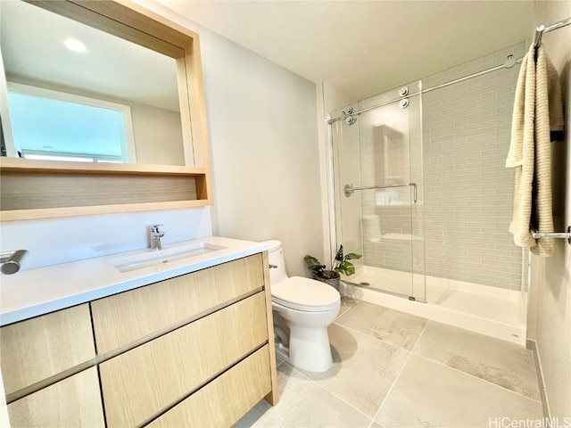 bathroom with vanity, walk in shower, toilet, and tile patterned floors