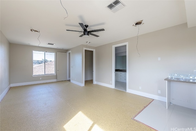 empty room featuring ceiling fan