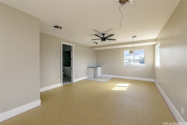 empty room featuring ceiling fan