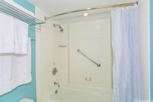 bathroom featuring shower / tub combo