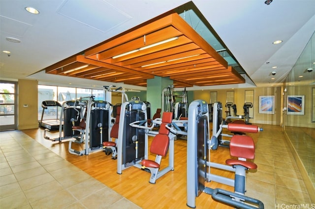 gym with tile patterned flooring