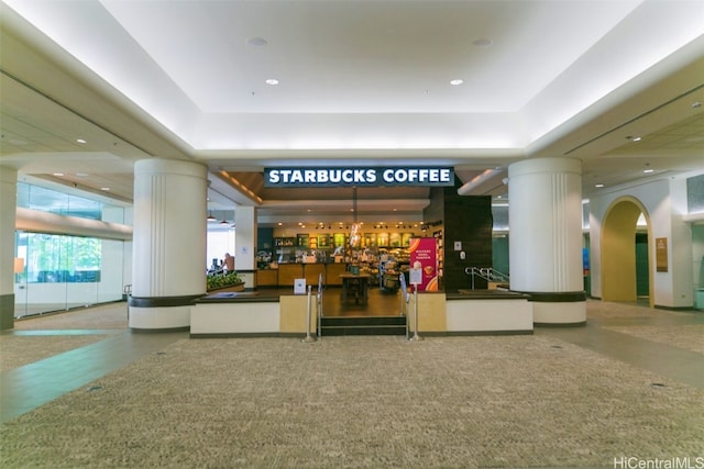 welcome area featuring ornate columns