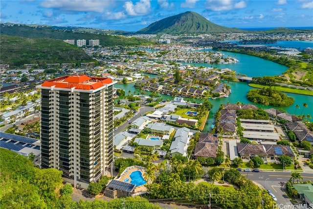 birds eye view of property featuring a water and mountain view