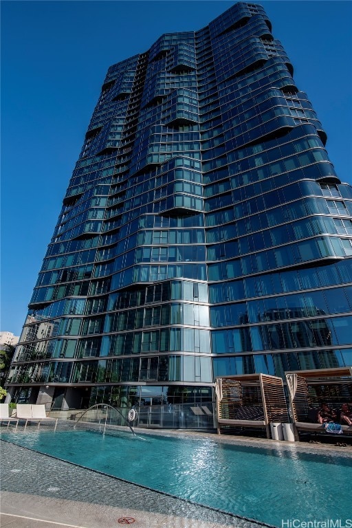 exterior space with pool water feature