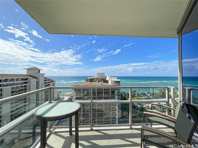 balcony featuring a water view