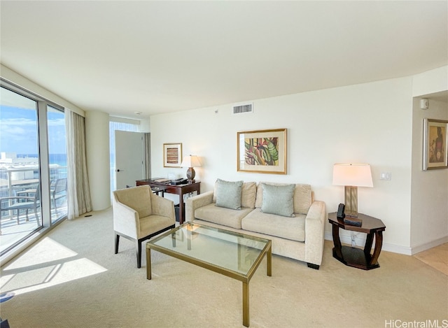 living room with light colored carpet